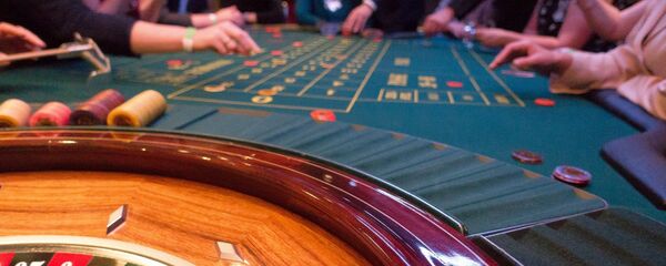 За зеленым сукном казино время летит незаметно - Sputnik Беларусь