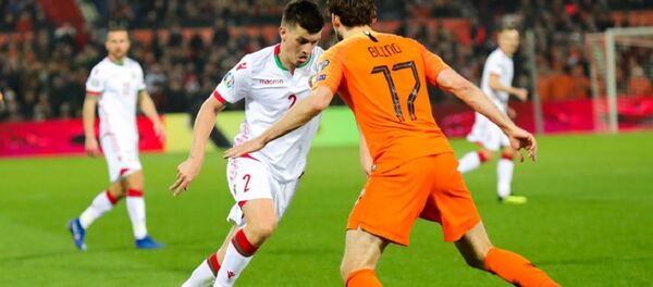 Момент футбольного матча Беларусь - Нидерланды Момент футбольного матча Беларусь - Нидерланды - Sputnik Беларусь