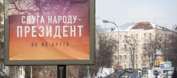 Агитационный плакат кандидата в президенты Украины Владимира Зеленского на одной из улиц в Киеве - Sputnik Беларусь