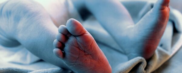 Новорожденный, архивное фото Новорожденный, архивное фото - Sputnik Беларусь