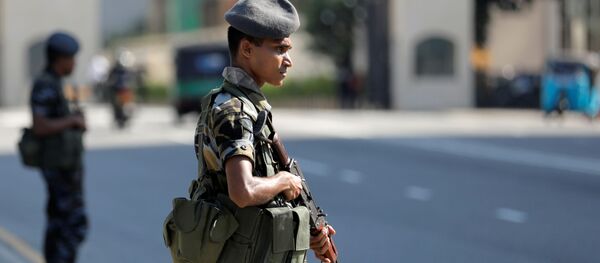 Военнослужащий в Коломбо Военнослужащий в Коломбо - Sputnik Беларусь