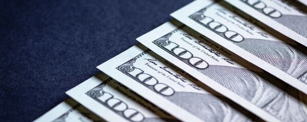 Долары, архіўнае фота Долары, архіўнае фота - Sputnik Беларусь