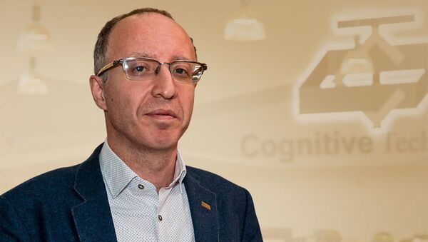 Руководитель департамента разработки беспилотных транспортных средств Cognitive Technologies Юрий Минкин - Sputnik Беларусь