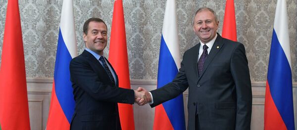 Председатель правительства России Дмитрий Медведев и премьер-министр Беларуси Сергей Румас Председатель правительства России Дмитрий Медведев и премьер-министр Беларуси Сергей Румас - Sputnik Беларусь