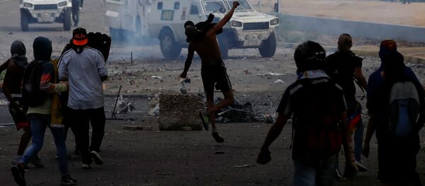 Митинг против правительства президента Венесуэлы Мадуро в Каракасе - Sputnik Беларусь