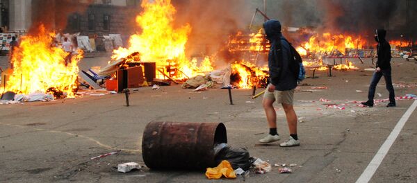 Горящие палатки активистов Антимайдана на Куликовом поле у Дома профсоюзов в Одессе Горящие палатки активистов Антимайдана на Куликовом поле у Дома профсоюзов в Одессе - Sputnik Беларусь