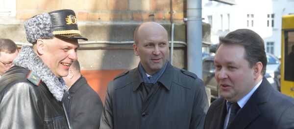 Бывший заместитель государственного секретаря Совета безопасности Беларуси полковник Андрей Втюрин (в центре) Бывший заместитель государственного секретаря Совета безопасности Беларуси полковник Андрей Втюрин (в центре) - Sputnik Беларусь