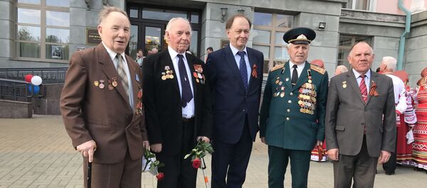 З кашай і песнямі. Віншаванні ў гонар Дня Перамогі прайшлі ў Доме Масквы - Sputnik Беларусь