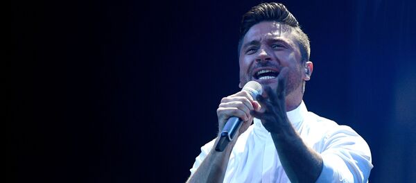 Спявак Сяргей Лазараў (Расія) падчас другога паўфіналу Еўрабачанне-2019 Спявак Сяргей Лазараў (Расія) падчас другога паўфіналу Еўрабачанне-2019 - Sputnik Беларусь