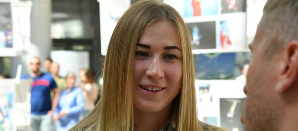 Олимпийская чемпионка по биатлону Динара Алимбекова - Sputnik Беларусь