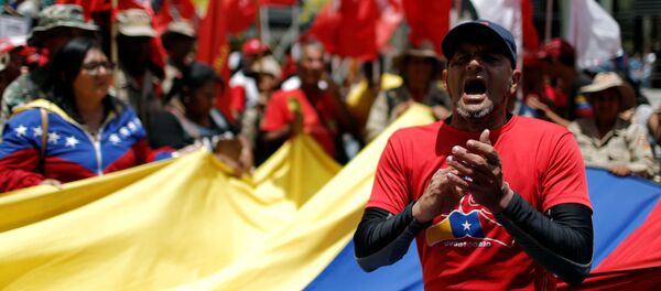 Митинг в поддержку правительства президента Венесуэлы Николаса Мадуро в Каракасе - Sputnik Беларусь