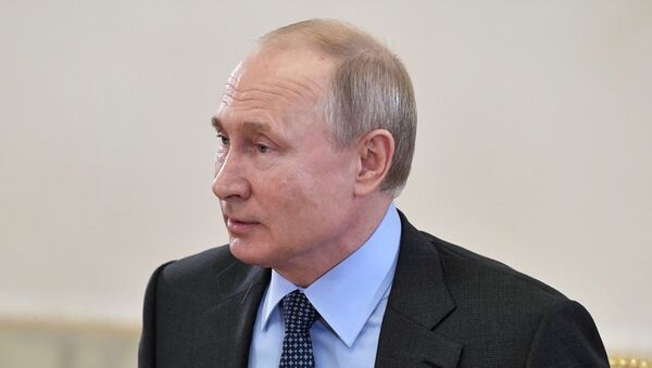 Владимир Путин во время встречи с руководителями и главными редакторами ведущих мировых информационных агентств - Sputnik Беларусь