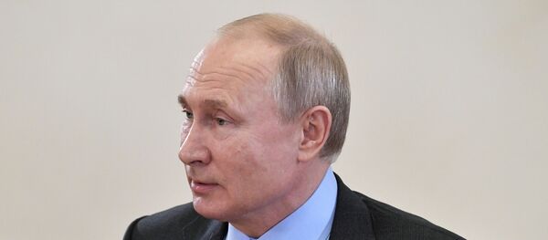 Владимир Путин во время встречи с руководителями и главными редакторами ведущих мировых информационных агентств - Sputnik Беларусь