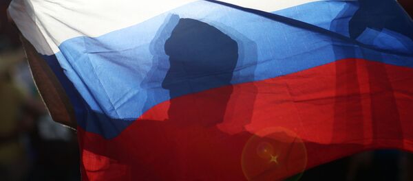 Болельщики празднуют победу российских спортсменов, архивное фото Болельщики празднуют победу российских спортсменов, архивное фото - Sputnik Беларусь