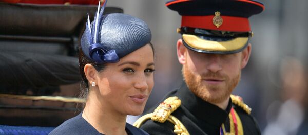 Принц Гарри и его супруга Меган Маркл Принц Гарри и его супруга Меган Маркл - Sputnik Беларусь
