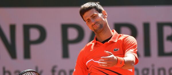 Новак Джокович в матче 1/2 финала мужского одиночного разряда Открытого чемпионата Франции по теннису против Доминика Тима - Sputnik Беларусь