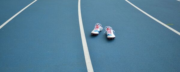 Шиповки ямайского на беговой дорожке стадиона Лужники  - Sputnik Беларусь