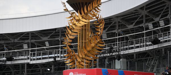 Алімпійскі факел на стадыёне Дынама Алімпійскі факел на стадыёне Дынама - Sputnik Беларусь