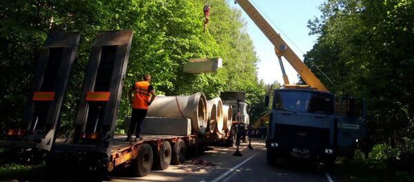 Работы на месте размытой дороги - Sputnik Беларусь