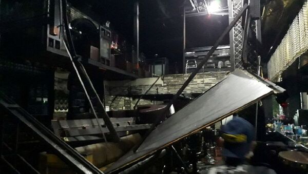 Балкон рухнул в ночном клубе Кореи: пострадали участники ЧМ по плаванию - Sputnik Беларусь