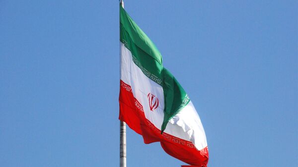 Флаг Ирана на одной из улиц Тегерана. - Sputnik Беларусь