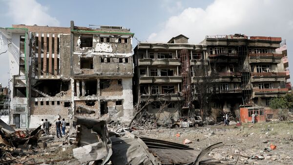Здание после воскресной атаки в Кабуле - Sputnik Беларусь