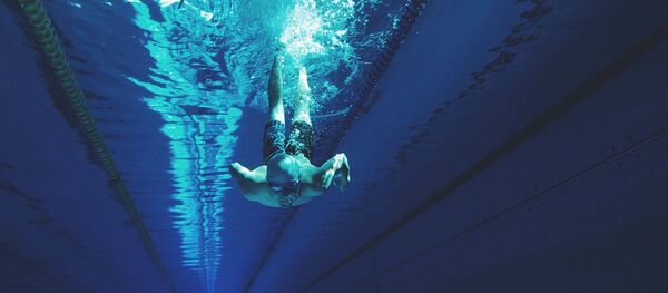 Пловец в бассейне, архивное фото - Sputnik Беларусь