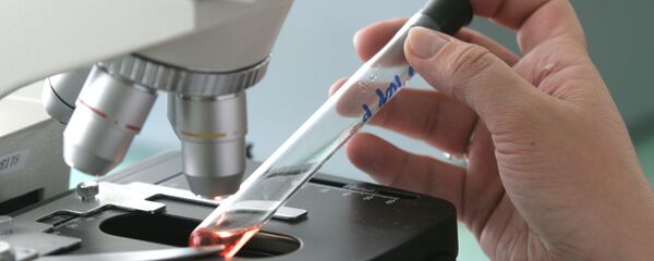 Во время работы в вирусологической лаборатории Во время работы в вирусологической лаборатории - Sputnik Беларусь