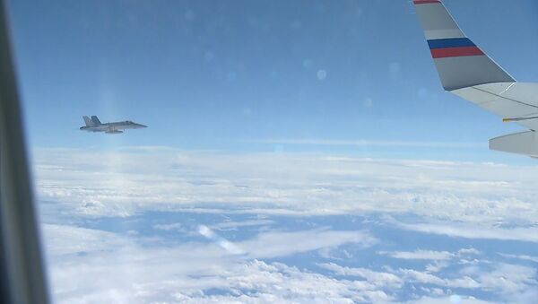 Лайнеры ВВС Швейцарии сопровождали российский самолет Ил-96 – видео - Sputnik Беларусь