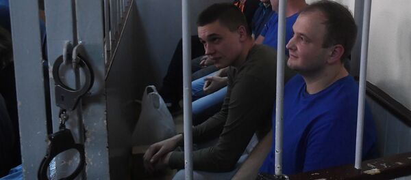 Задержанные украинские моряки на заседании Лефортовского суда города Москвы Задержанные украинские моряки на заседании Лефортовского суда города Москвы - Sputnik Беларусь