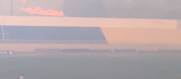 Футбольный матч в Бразилии прервали из-за дыма от лесного пожара - Sputnik Беларусь