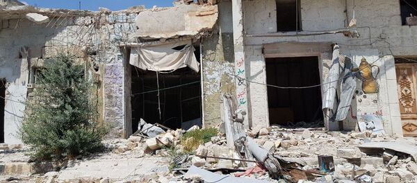Сирийский город Хан-Шейхун в провинции Идлиб Сирийский город Хан-Шейхун в провинции Идлиб - Sputnik Беларусь