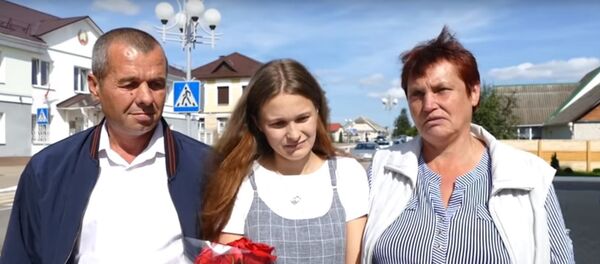 Пропавшая двадцать лет назад девочка встретилась с родителями Пропавшая двадцать лет назад девочка встретилась с родителями - Sputnik Беларусь