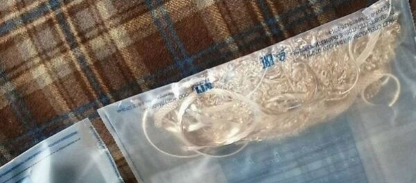 Часть золотых изделий, похищенных из магазина - Sputnik Беларусь