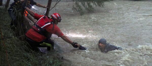 Работа спасателей во время тропического шторма, архивное фото - Sputnik Беларусь