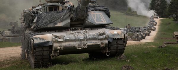Калона танкаў M1 Abrams, архіўнае фота Калона танкаў M1 Abrams, архіўнае фота - Sputnik Беларусь