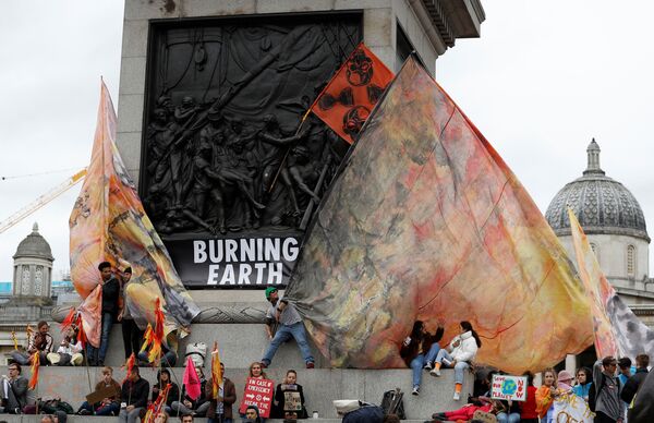 Экоактивисты заблокировали улицы в Амстердаме, Париже и Лондоне - Sputnik Беларусь