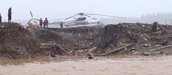 Поисково-спасательная операция в Красноярском крае, где прорвало дамбу - Sputnik Беларусь