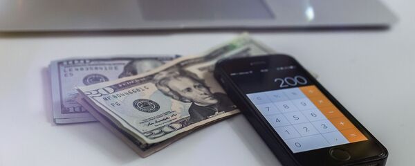 Доллары и калькулятор - Sputnik Беларусь