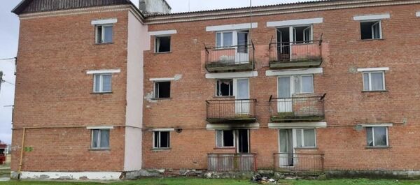 Дом, в котором произошел пожар Дом, в котором произошел пожар - Sputnik Беларусь