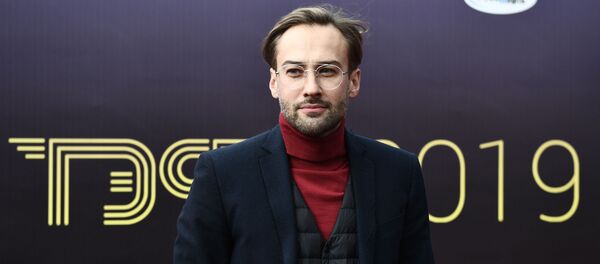 Телеведущий Дмитрий Шепелев Телеведущий Дмитрий Шепелев - Sputnik Беларусь