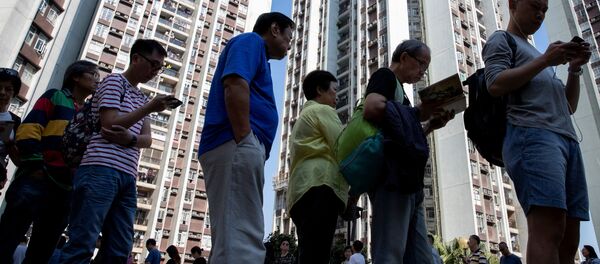 Очереди на избирательных участках в Гонконге - Sputnik Беларусь