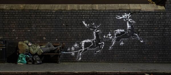 Бэнкси создал рождественское граффити, посвященное бездомным  - Sputnik Беларусь