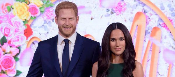 Фигуры принца Гарри и его жены Меган Маркл - Sputnik Беларусь