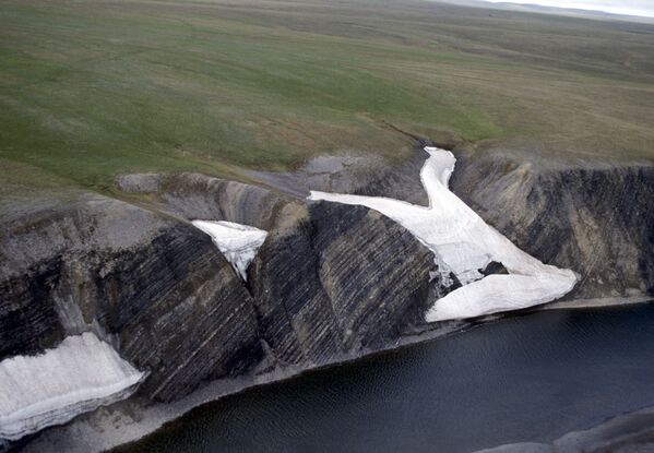 Река в каньонах на полуострове Таймыр, который входит в Большой Арктический заповедник. Большую часть года на этой территории, непосредственно примыкающей к северному полярному кругу, лежит снег, сходящий только летом на короткое время.  - Sputnik Беларусь