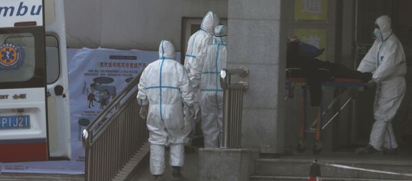 Пациента, зараженного новым типом короновируса, привезли в госпиталь в Китае - Sputnik Беларусь