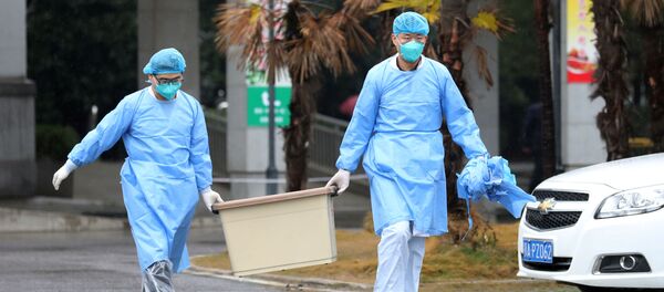 Китайские врачи в Ухане - Sputnik Беларусь