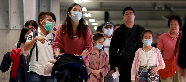 Жители Китая в защитных масках - Sputnik Беларусь
