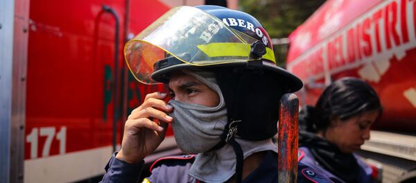 Венесуэльские пожарные, архивное фото Венесуэльские пожарные, архивное фото - Sputnik Беларусь