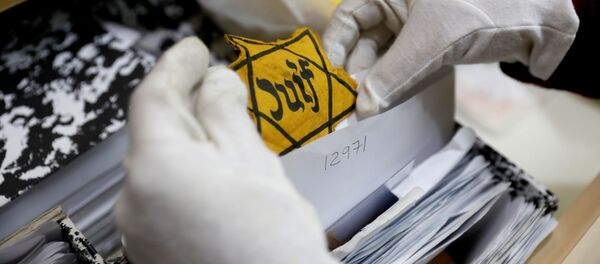 Нашивка из нацистского лагеря смети, архивное фото - Sputnik Беларусь